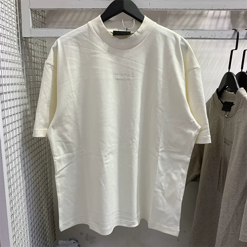 FOG ESSENTIALS Off‑White Mock Neck Tee Embossed Logo Short Sleeve