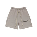 Fear of God Essentials Cursive Logo Sweat Shorts