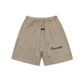Fear of God Essentials Cursive Logo Sweat Shorts