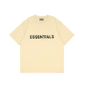 ESSENTIALS Cream Yellow Crew Neck Tee Bold Black Front Logo Short Sleeve