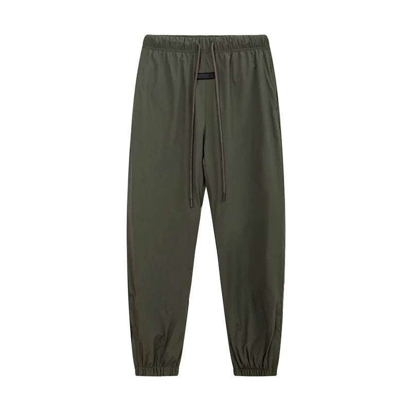 Fear of God Essentials Zipper‑Cuff Nylon Jogger Pants